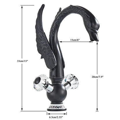 Brass basin faucet deck mounted with black swan design antique brass finish and crystal knob detailing