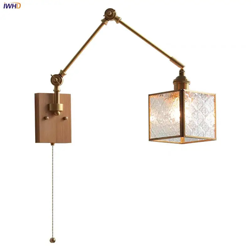Brass-finished adjustable wall sconce with blue glass embossed shade and decorbites ash wood for bedroom lighting