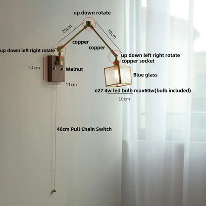 Adjustable brass decorbites ash wood wall sconce with blue glass shade and walnut-finished mounting plate for bedroom light