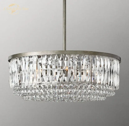 A modern brass decorbites crystal round pendant chandelier with clear prisms for elegant dining room lighting