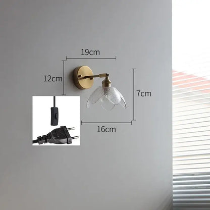 Brass flower gray glass led bathroom wall lamp featuring a delicate brass wall sconce with textured glass shade