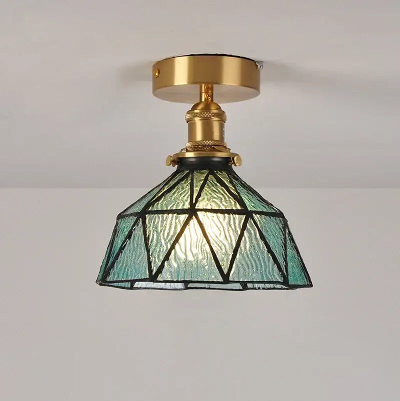 Teal stained glass shade pendant ceiling lamp with brass fixture and geometric leaded design for kitchen lights