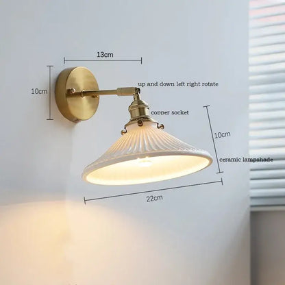 Brass ribbed ceramic led wall sconce lamp with off-white ceramic shade for bedroom mirror lighting by decorbites ceramic led
