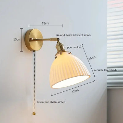 Brass ribbed ceramic led wall sconce with cream shade and copper socket for bedroom mirror lighting decorbites ceramic led
