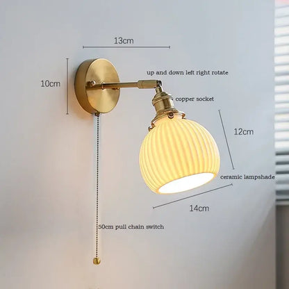 Brass ribbed decorbites ceramic wall sconce with iron arm and adjustable copper socket for bedroom lighting