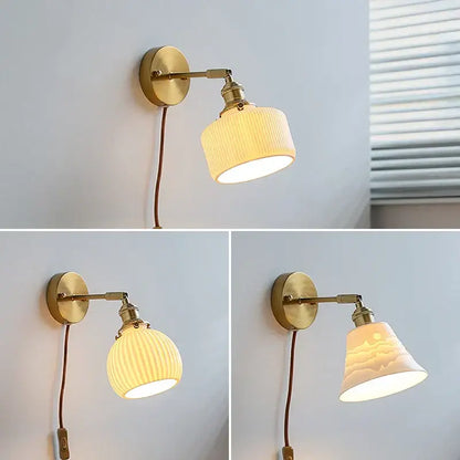 Brass ribbed decorbites ceramic wall sconce with off-white shade and iron arm for bedroom lighting