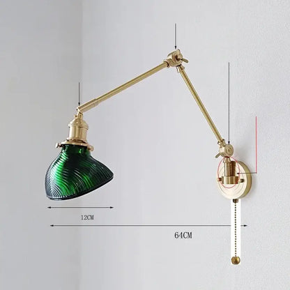 Vintage-style brass wall lamp with adjustable arm and deep green ribbed glass shade for decorbites ceramic copper led sconce