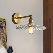 Brass scalloped glass shade bedside sconce light fixture with clear fan-shaped glass shade and exposed led bulb
