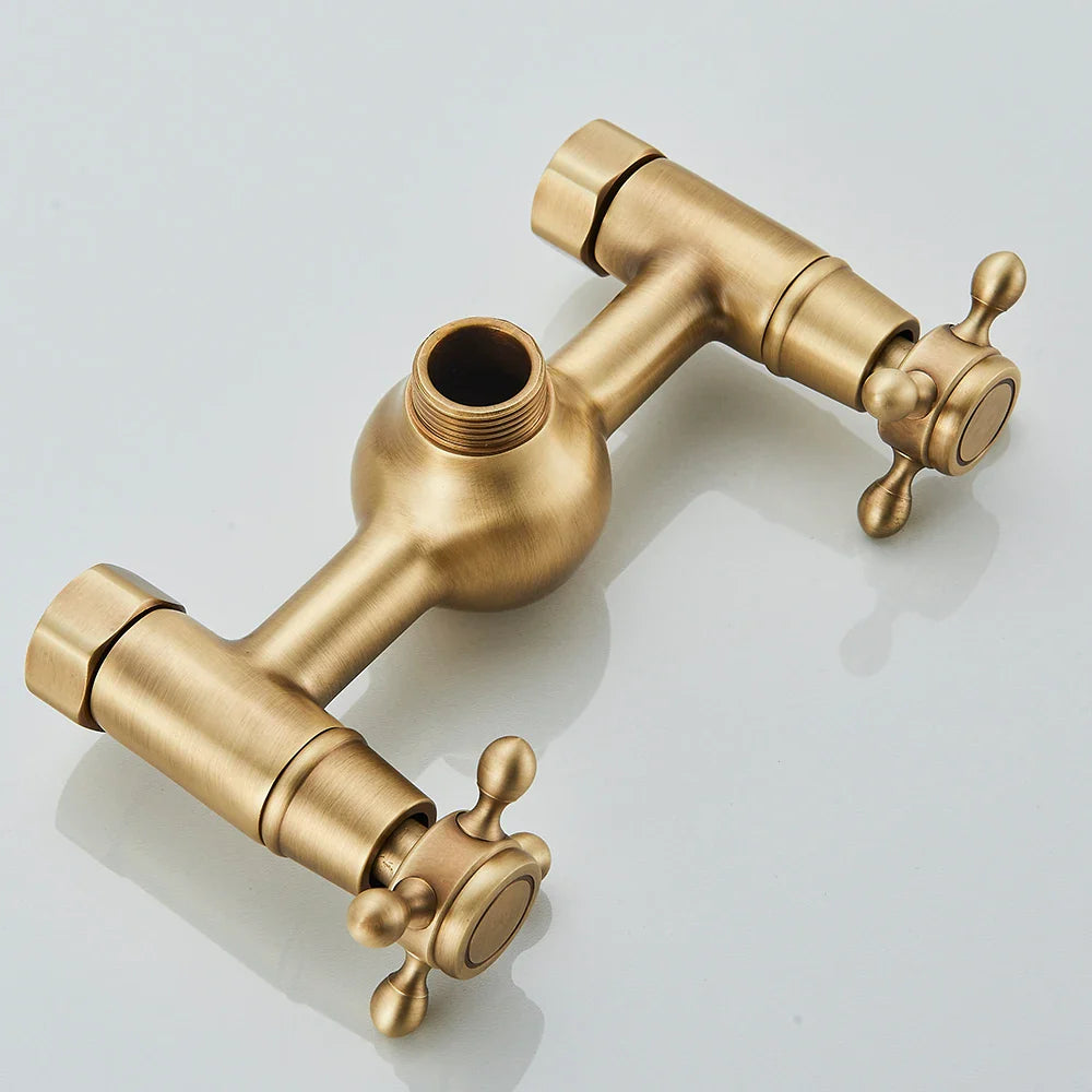 Antique brass wall-mounted brass shower faucet set with dual cross handles and central spherical body
