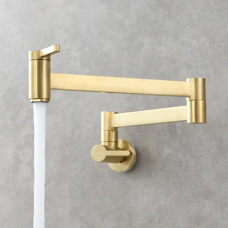 Brass wall mounted pot filler kitchen faucet with brass finish, articulated gooseneck, and dual handles for precise control