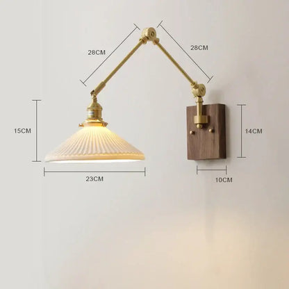 Adjustable brass wall sconce with ribbed off-white glass shade and wooden mounting plate featuring copper swing arm led design