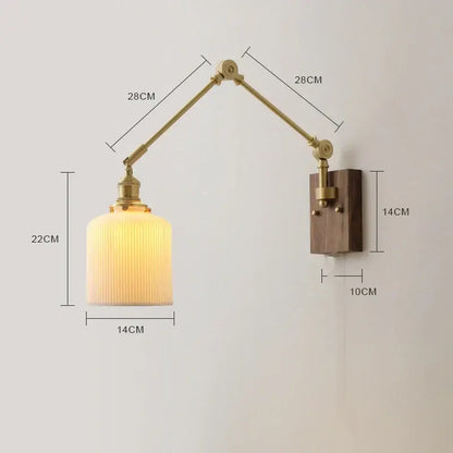 Adjustable brass wall sconce with copper swing arm led and warm ribbed glass shade on walnut wooden mounting plate