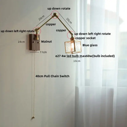 Adjustable brass walnut led wall lamp with rotatable blue glass shade and walnut-finished mounting plate wall lamp