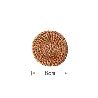 Brie cheese sandwich printed glass coffee mug on a round natural brown rattan woven coaster with tight concentric pattern