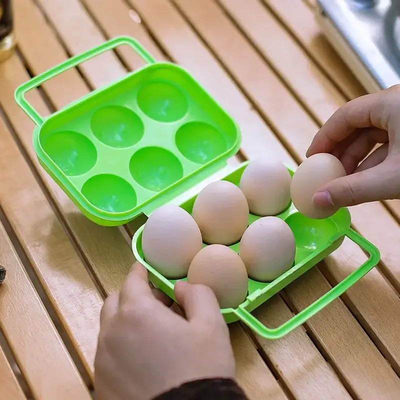 Bright green plastic egg holder storage box with handle designed to hold and transport six eggs in the kitchen