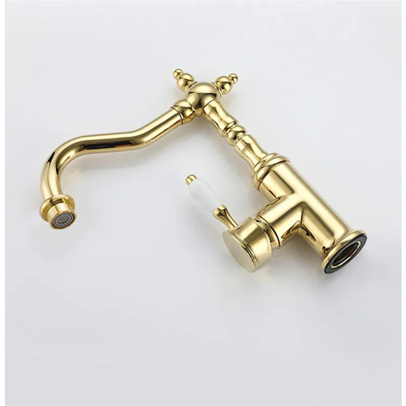 Bronze basin faucet antique deck mounted with gold vintage style, ornate detailing, and pull-down spout for cold water