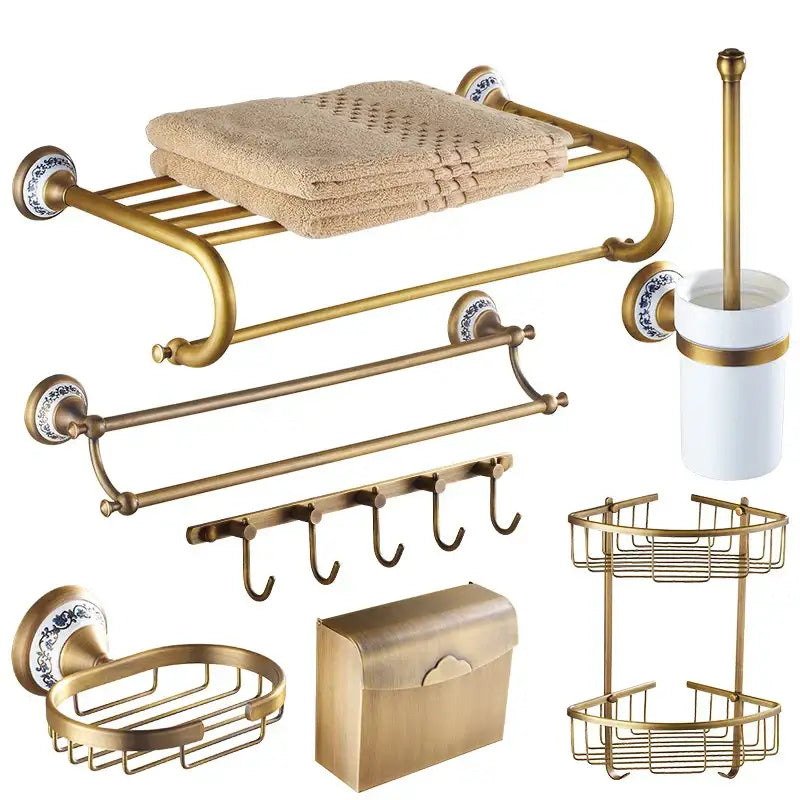 Antique brass-finished bronze bathroom hardware set with blue and white ceramic detail for elegant decorbites bronze bathroom decor