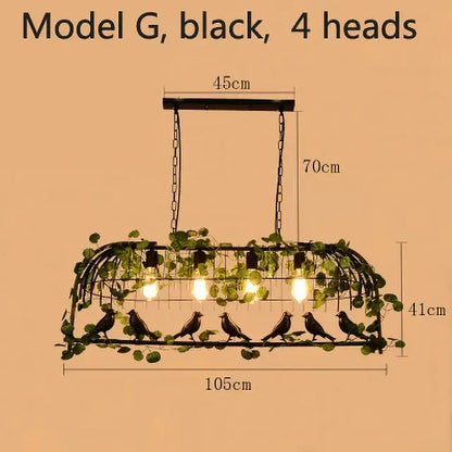 Black metal decorbites birdcage pendant lights with four bulbs and green vine accents for dining room decor