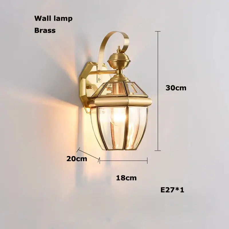 Bronze black glass globe chandelier with brass wall lamp featuring classic lantern design and elegant curved arm
