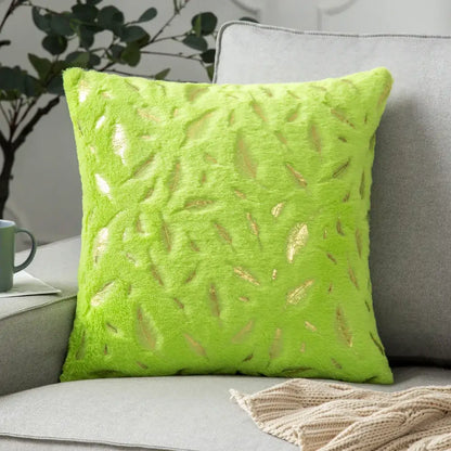 Vibrant lime green velvet throw pillow with bronzed feather style metallic gold appliques for living room decor