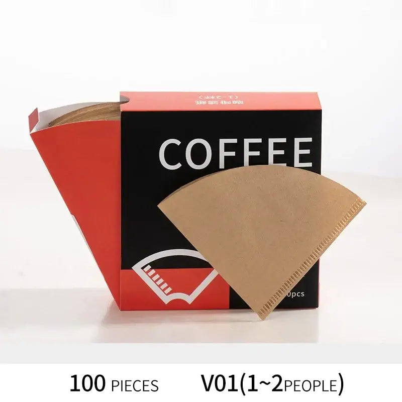 A single brown filter paper coffee cone with serrated edge beside red and black decorbites coffee cone packaging