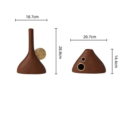 Brown geometric triangle ceramic vase with slender neck and circular openings for living room gold accent decorbites
