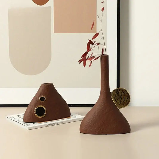 Brown geometric triangle ceramic vase with slender neck textured surface and gold-toned circular accents for living room decorbites geometric triangle decor