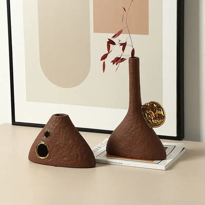 Brown geometric triangle ceramic vase with textured surfaces and gold accents for living room decorbites decor