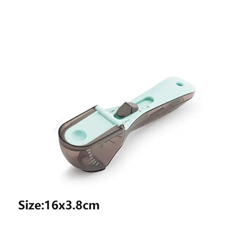 A sleek two-toned adjustable measuring cup with a translucent brown body and mint green accents for precise measuring