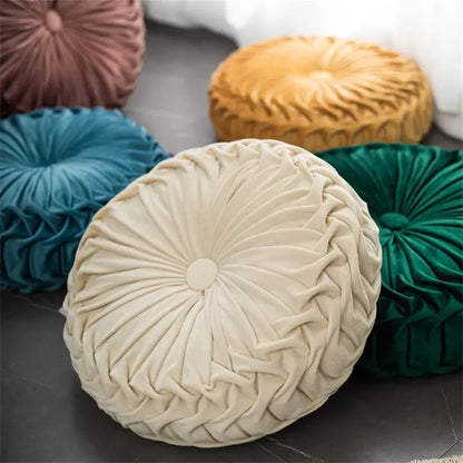 Cream-colored velvet round seat cushion with central button and pleats for living room dutch velvet round seat