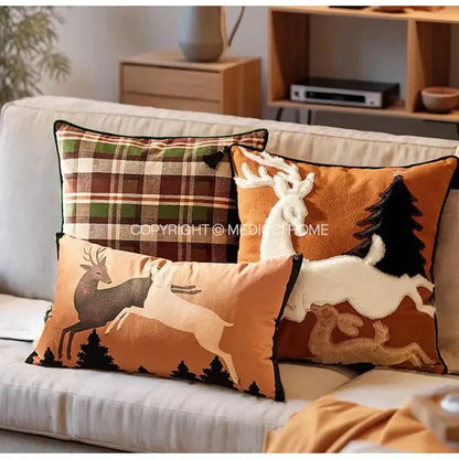 Brown velvet handmade reindeer applique cushion cover with three decorative throw pillows in earthy forest tones
