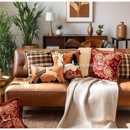 Set of four decorbites handmade reindeer applique cushion covers in brown velvet with woodland deer and tree motifs