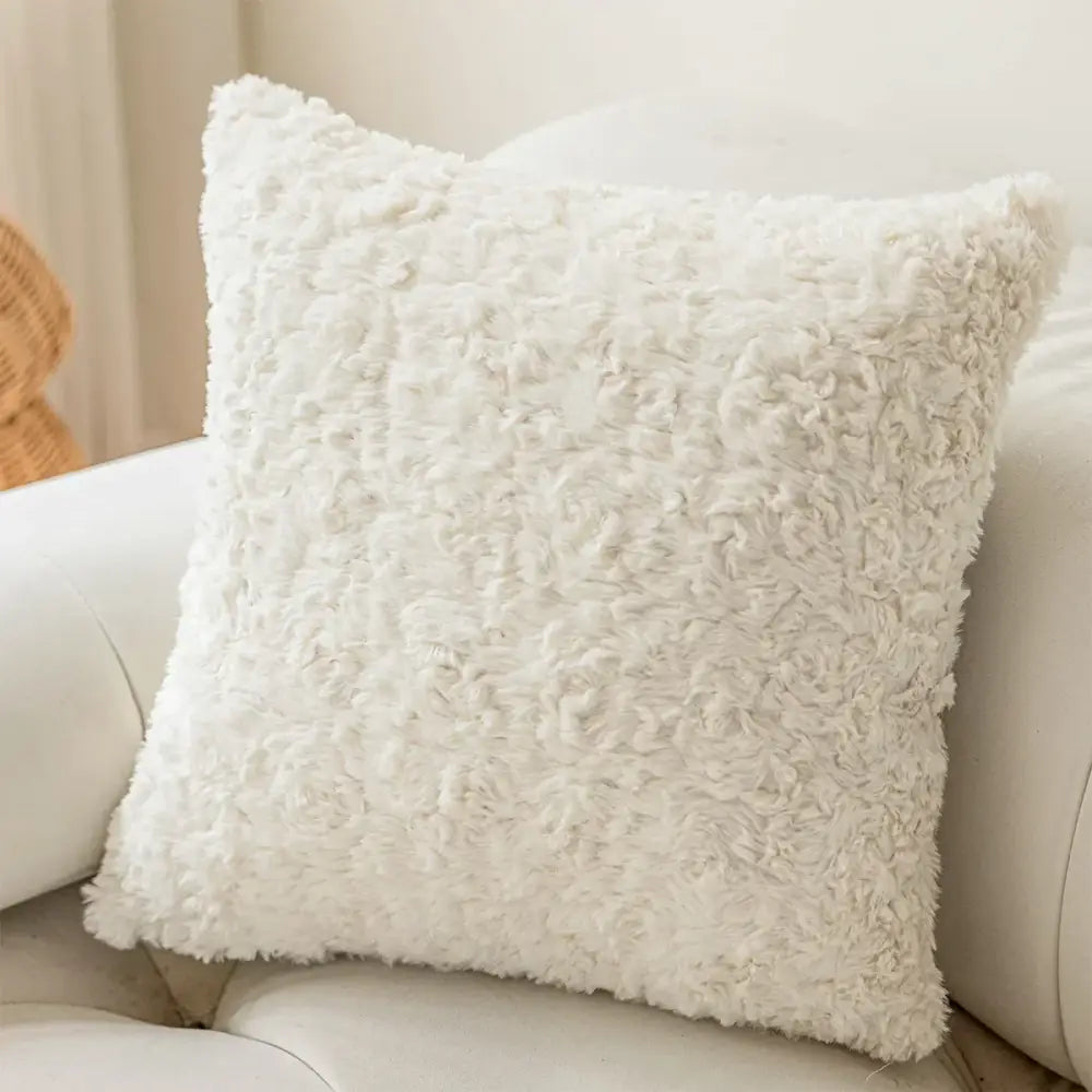 White fluffy faux fur throw pillow with soft texture for living room decor featuring decorbites geometric embroidery cushion cover