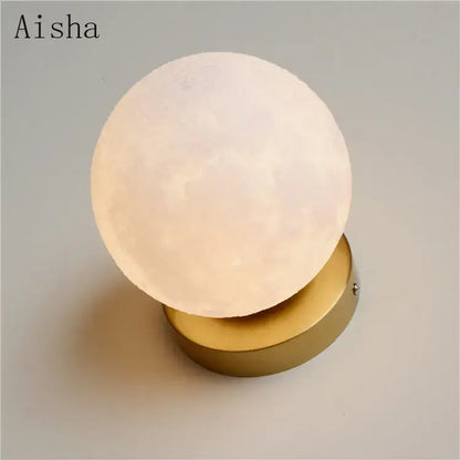 Aisha brand spherical moon lamp with matte white textured surface on polished gold base decorbites circular planet wall lamp