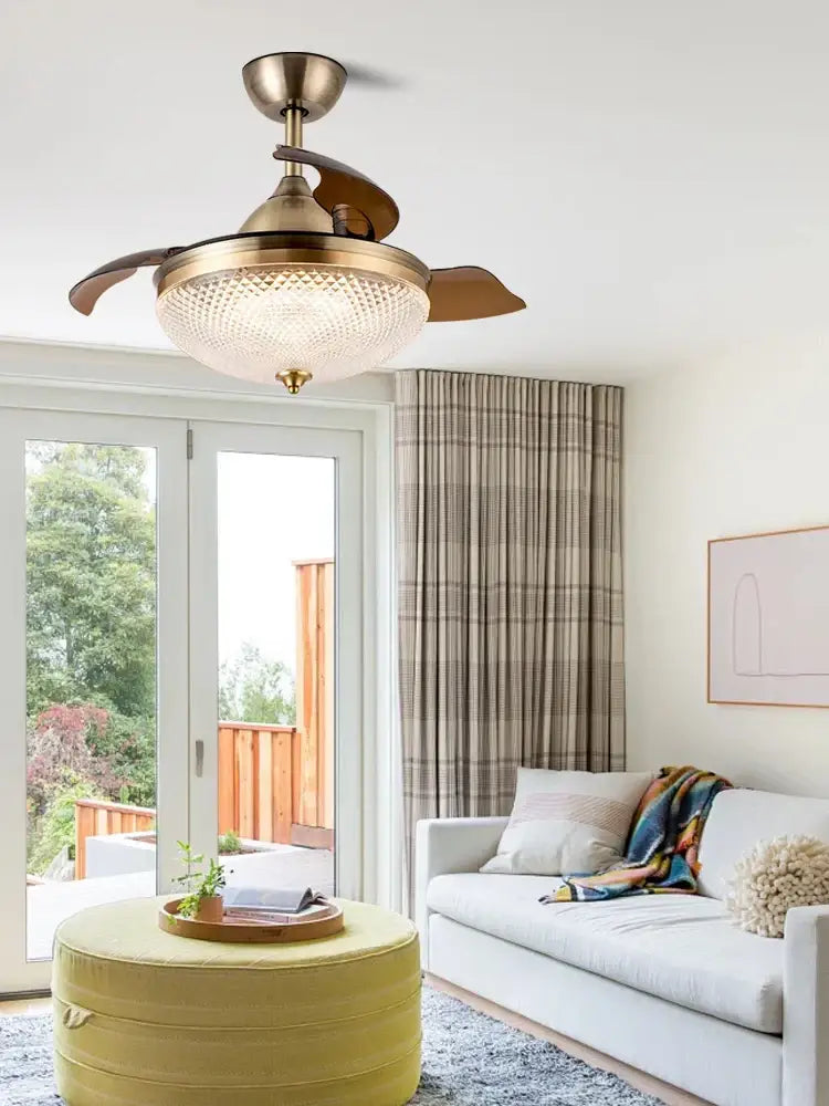 Brushed copper led ceiling fan with remote control featuring brass finish, three wooden blades, and textured glass shade for living room decorbites