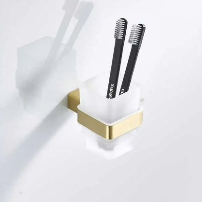 Modern brushed gold and white stainless steel toothbrush holder with two black toothbrushes decorbites brushed gold decor