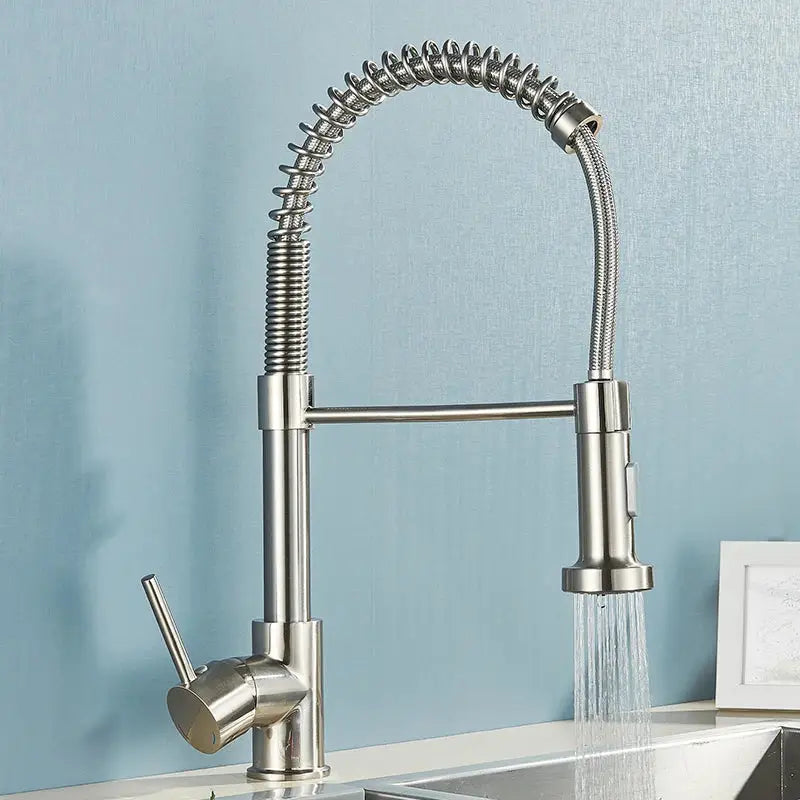 Brushed gold kitchen faucet with stainless steel flexible coiled spring hose and pull-down spray head for kitchen use
