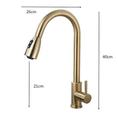 Brushed gold kitchen faucet with pull down spray head featuring a brass finish curved spout and integrated control knob decorbites