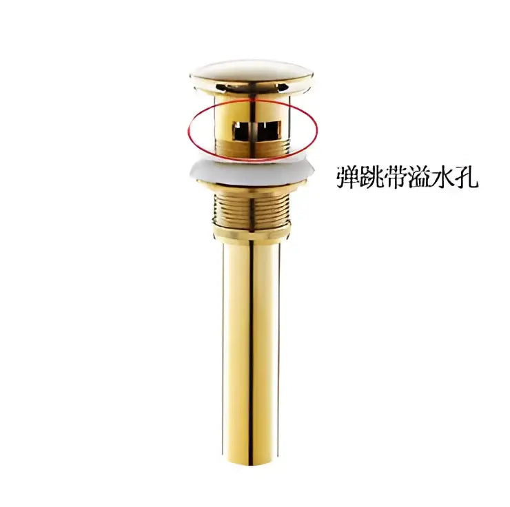 Brushed gold brass pop-up drain stopper with polished finish and sleek cylindrical design for bathroom sink drains