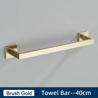 Brushed gold stainless steel bathroom accessories set featuring a towel bar with modern square mounting plates