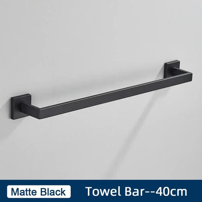 Matte black metal towel bar with sleek modern design included in brushed gold stainless steel bathroom accessories set