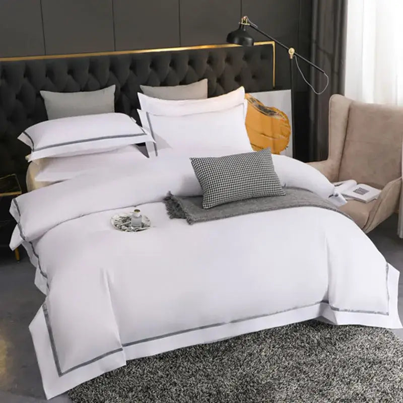 White satin-like duvet cover with elegant gray piping trim in decorbites brushed hotel style bedding sets