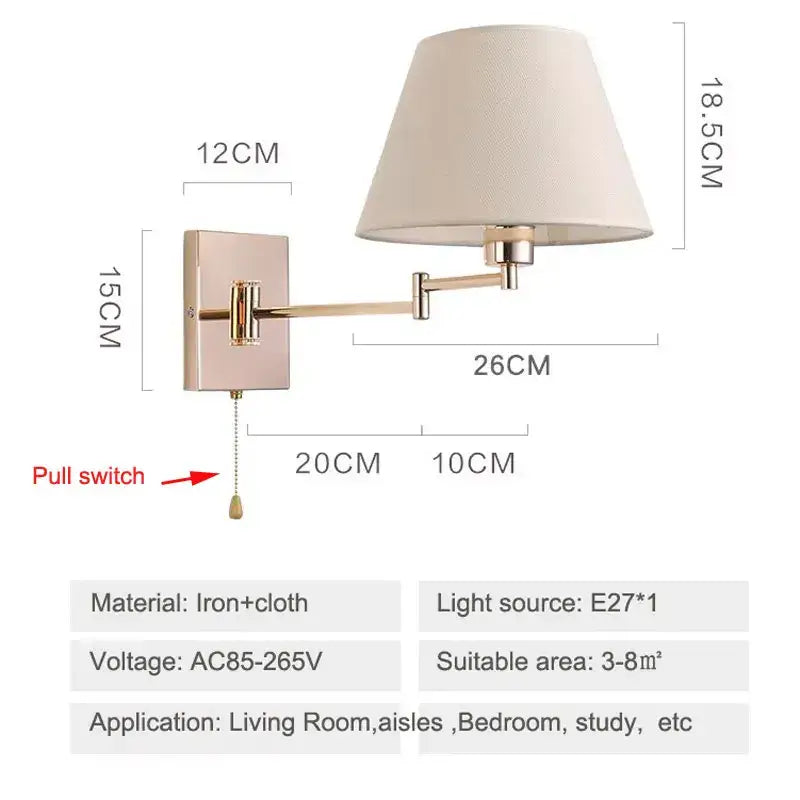 A rose gold wall lamp with an adjustable rocker arm and cream fabric shade for living room use