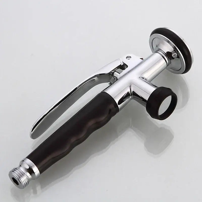 Chrome finished kitchen shower head with textured black rubber grip and circular trigger for easy kitchen shower use
