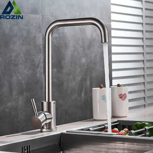 Brushed nickel kitchen faucet by decorbites with a sleek curved swivel spout and single lever handle in stainless steel