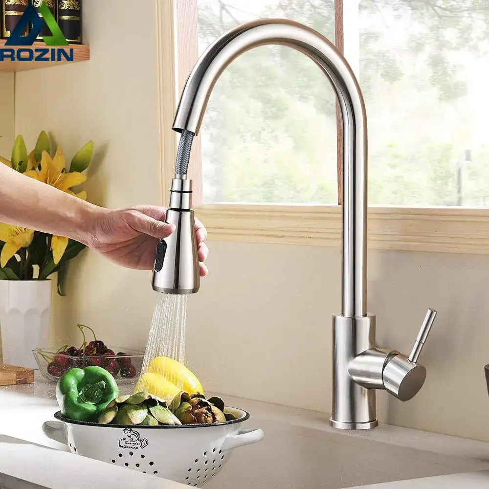Brushed nickel pull out kitchen faucet with sleek arched spray head by DecorBites in stainless steel finish
