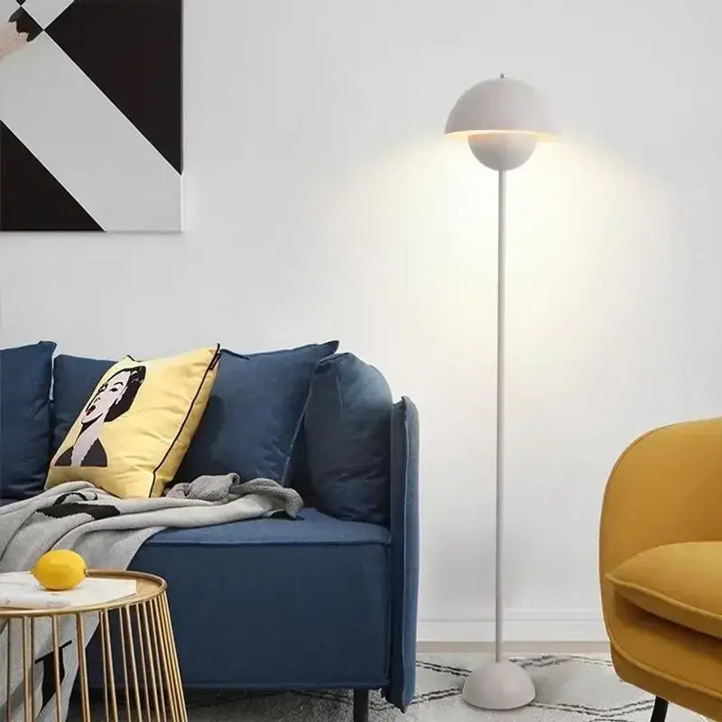 White minimalist floor lamp with a rounded dome shade in the burgundy bud floor lamp flower shade bedroom light series