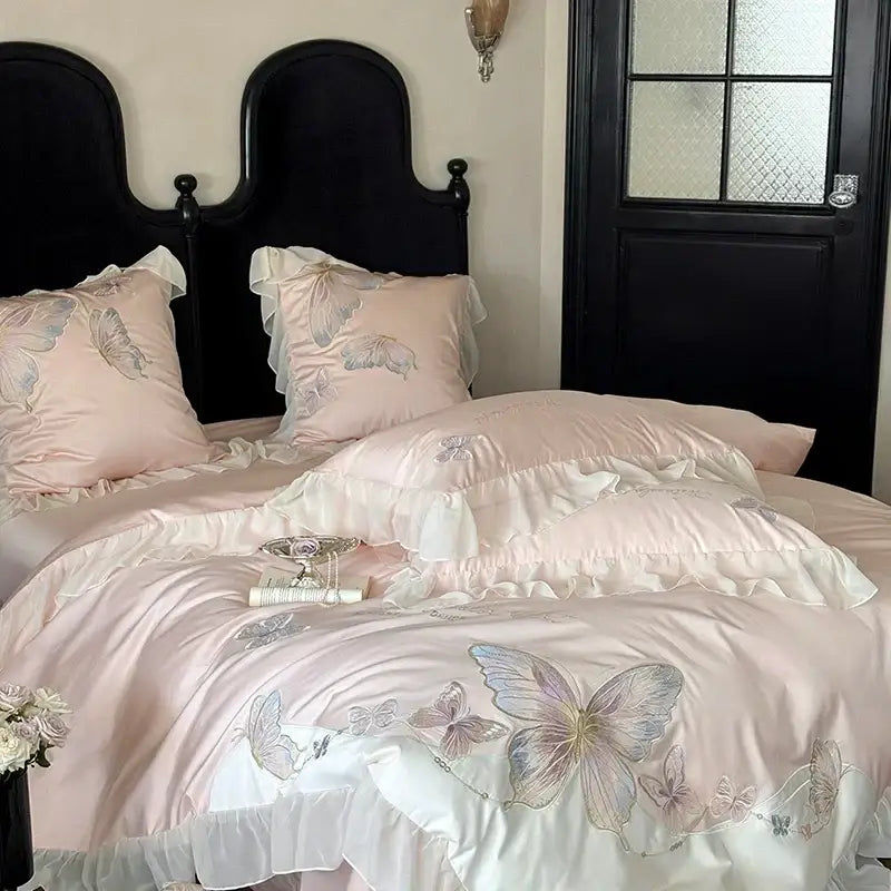 Pink satin bedding set with lace ruffles and decorbites butterfly embroidery in cotton for elegant bedroom decor