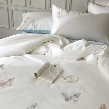 White lyocell cotton bedding set with soft pastel decorbites butterfly embroidery on satin duvet cover