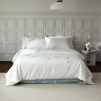 White satin lyocell cotton bedding set with soft pastel decorbites butterfly embroidery and light blue inner lining